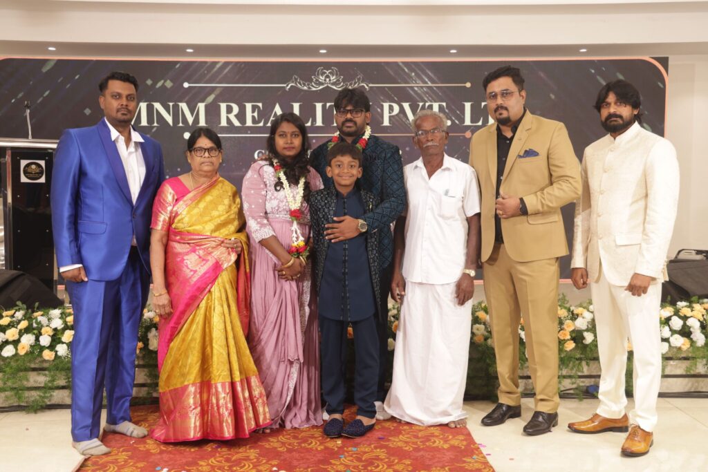 MNM Enterprises Anniversary Celebration team celebrating success