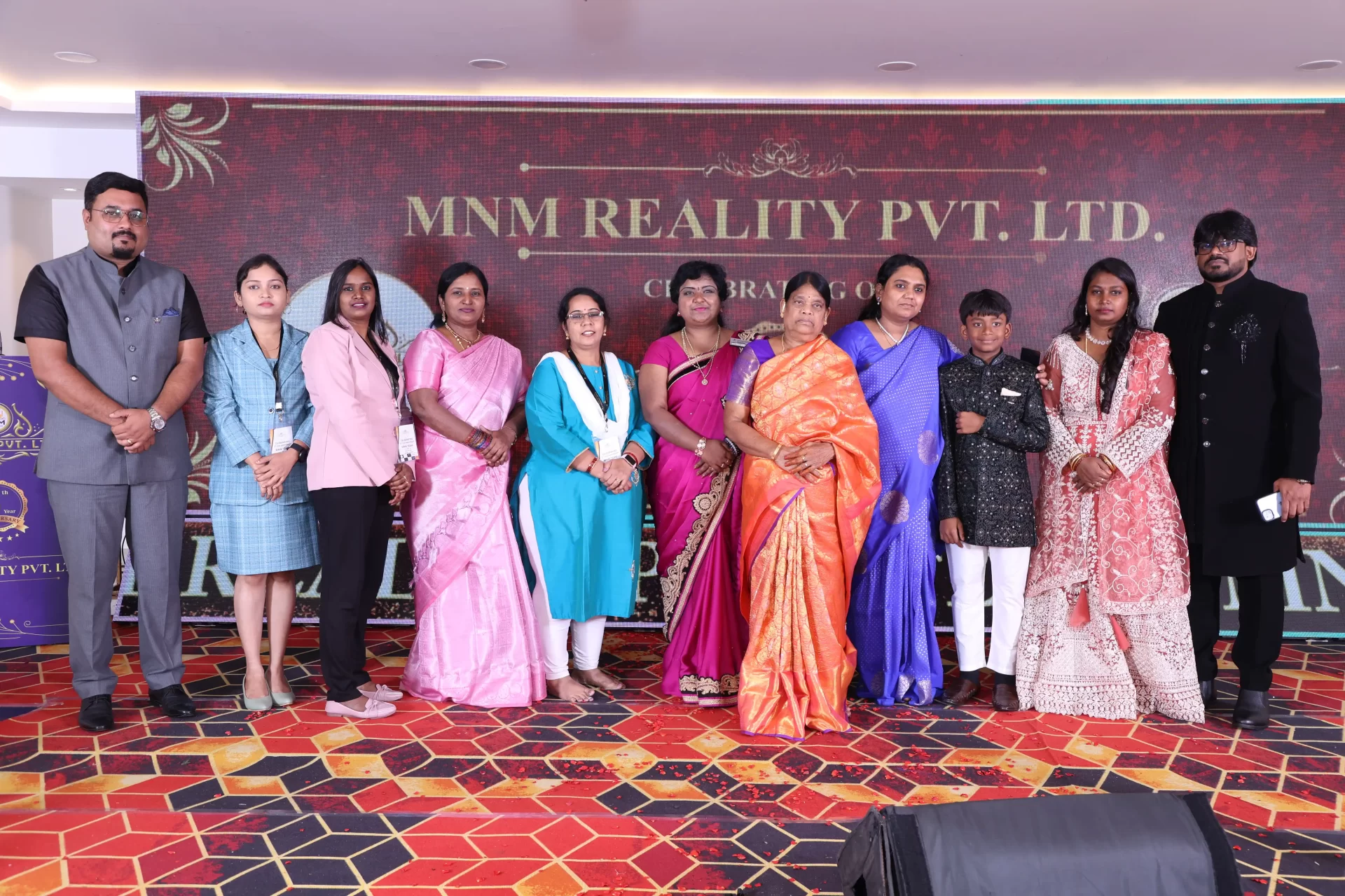 MNM Enterprises Anniversary Celebration team enjoying anniversary event