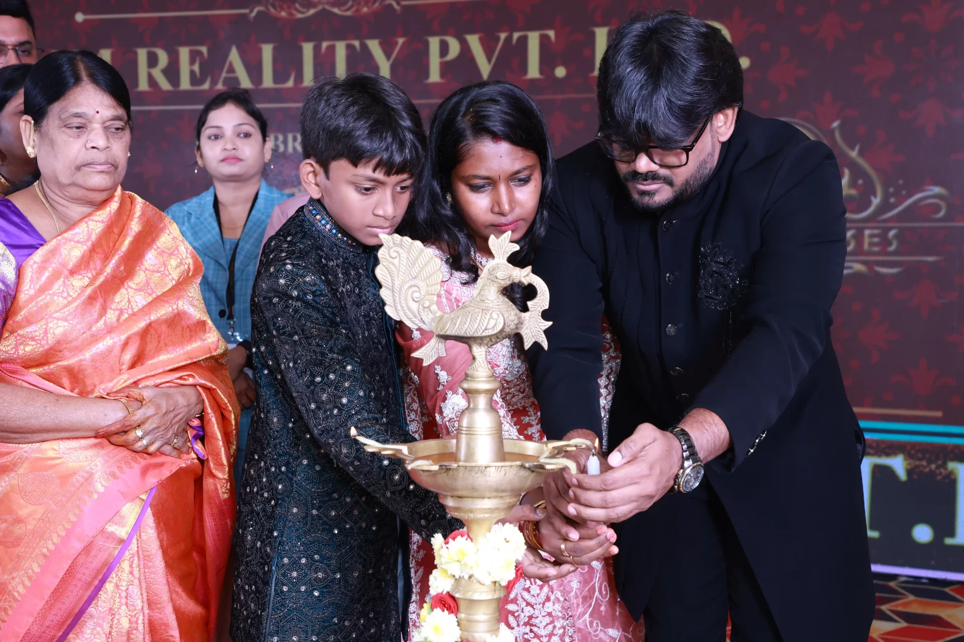 MNM Enterprises Anniversary Celebration event with team members