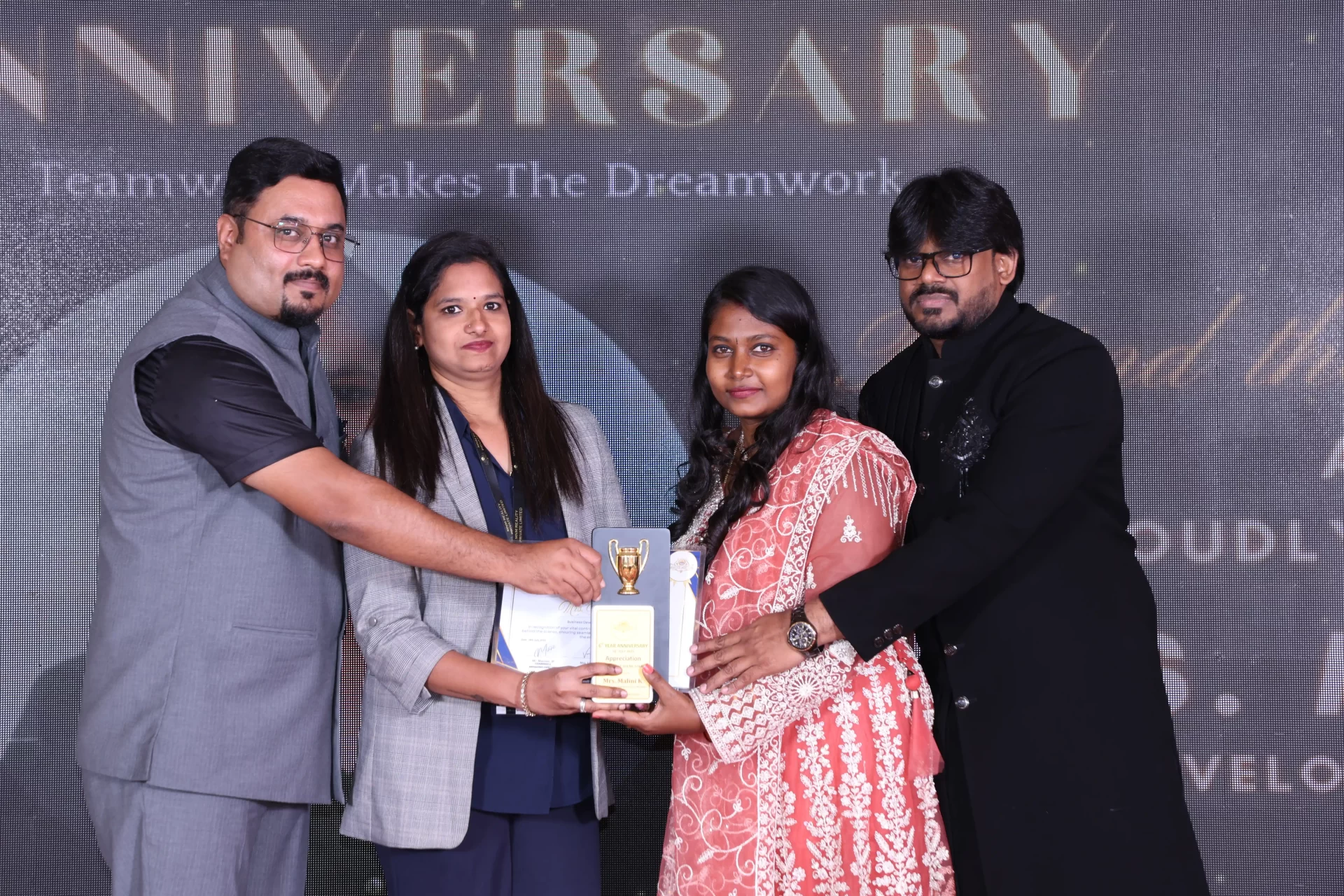 MNM Enterprises Anniversary Celebration group celebration photo