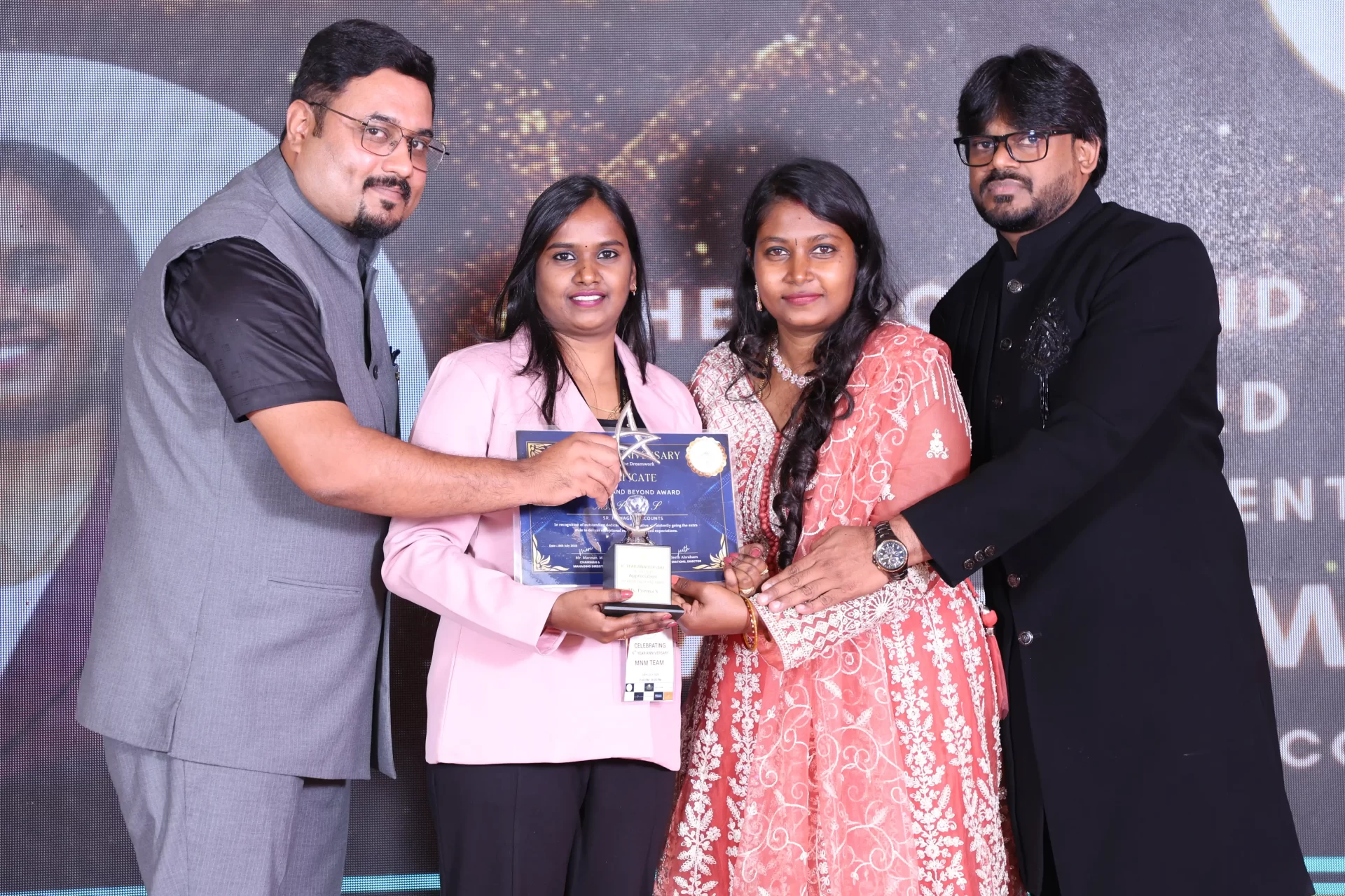 MNM Enterprises Anniversary Celebration happy moments with staff