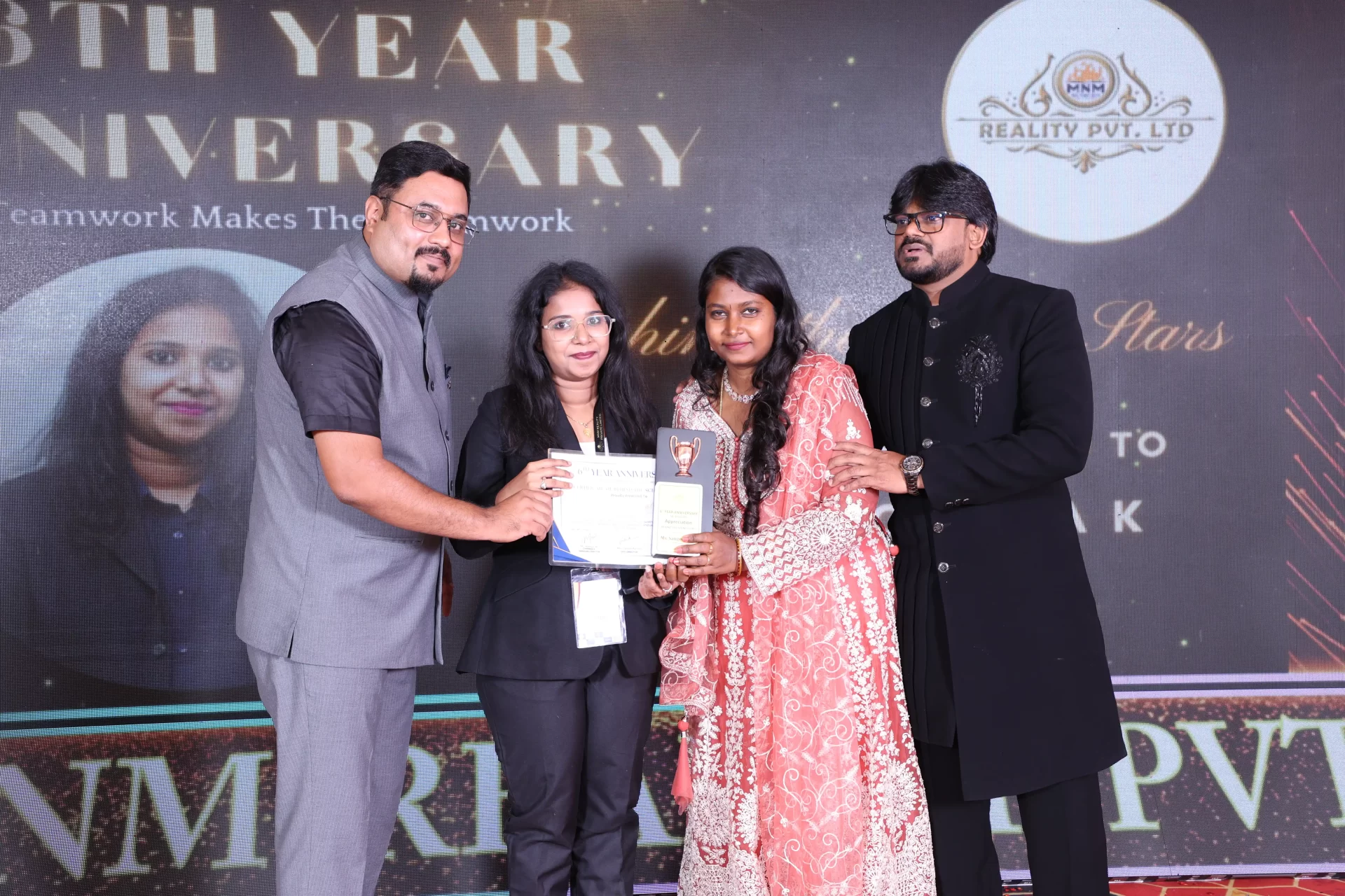 MNM Enterprises Anniversary Celebration cake cutting ceremony